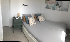 A bed or beds in a room at Tarifa Sol y Sal