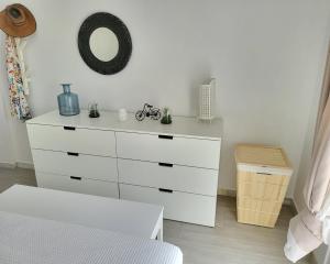 A bed or beds in a room at Tarifa Sol y Sal