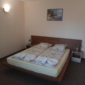 Postel nebo postele na pokoji v ubytování Hotel Orchidea