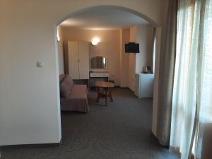 TV a/nebo společenská místnost v ubytování Hotel Orchidea