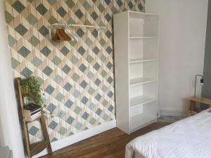 Posteľ alebo postele v izbe v ubytovaní 1st Floor Cozy Central Flat with free parking
