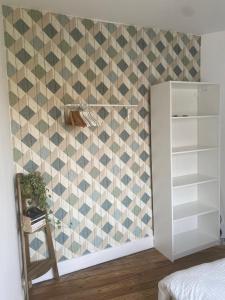 Posteľ alebo postele v izbe v ubytovaní 1st Floor Cozy Central Flat with free parking