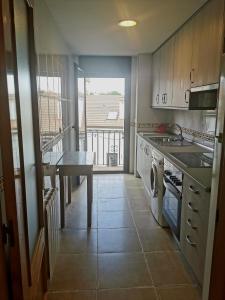 Kuchnia lub aneks kuchenny w obiekcie Riaza Vacacional - Apartamento en el centro
