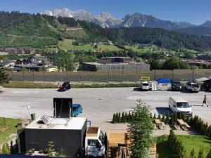 an aerial view of a parking lot with mountains at Bike hostel Schladming in Schladming