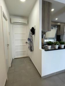 Kuchyňa alebo kuchynka v ubytovaní OverTheSea - PUEBLECITO Apartment