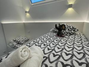 Posteľ alebo postele v izbe v ubytovaní OverTheSea - PUEBLECITO Apartment