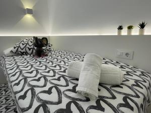Posteľ alebo postele v izbe v ubytovaní OverTheSea - PUEBLECITO Apartment