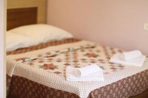 Letto o letti in una camera di Lilia guesthouse