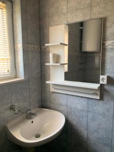 Kúpeľňa v ubytovaní Apartments Villa Ohana