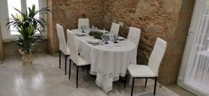 Reštaurácia alebo iné gastronomické zariadenie v ubytovaní Villa Carneira