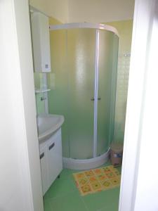 Ванная комната в Apartments Mišon
