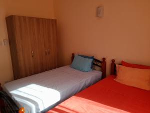 Postel nebo postele na pokoji v ubytování Villa Paprika