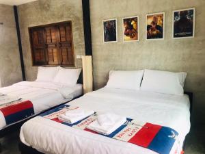 Postel nebo postele na pokoji v ubytování SolarCell Private Homestay - โซล่าเซลล์ไพรเวทโฮมสเตย์ + 37 fotografií