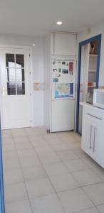 Kuchnia lub aneks kuchenny w obiekcie Infinity Apartment