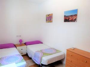 Postel nebo postele na pokoji v ubytování Casa Maria