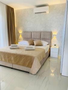 Posteľ alebo postele v izbe v ubytovaní Sunshine House Makarska with Free Beach Parking