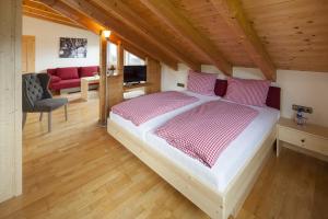 Postel nebo postele na pokoji v ubytování Alpe Oberstdorf