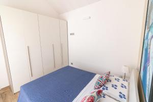 Postel nebo postele na pokoji v ubytování Suite Frida Rimini