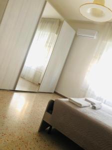 Postel nebo postele na pokoji v ubytování B&B dell'Amicizia