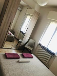 Postel nebo postele na pokoji v ubytování B&B dell'Amicizia