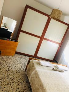 Postel nebo postele na pokoji v ubytování B&B dell'Amicizia