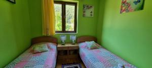 Postel nebo postele na pokoji v ubytování Apartment Ombla