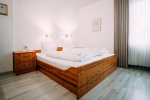 Postel nebo postele na pokoji v ubytování Hotel Brandaris