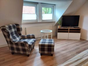 TV a/nebo společenská místnost v ubytování Apartment 1 Unter den Eichen