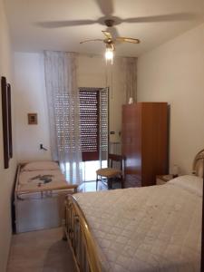 Postel nebo postele na pokoji v ubytování Casa de Candia