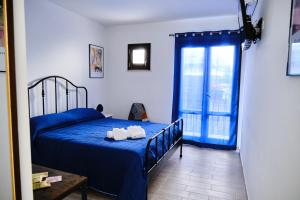 A bed or beds in a room at Mercede Rooms