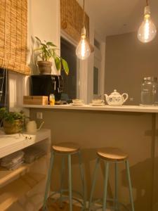 Kuchyň nebo kuchyňský kout v ubytování Tiny Beachhouse