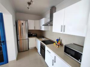 Kuchyň nebo kuchyňský kout v ubytování Villa Aroa by Villalia