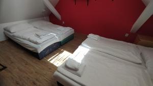 Posteľ alebo postele v izbe v ubytovaní Hotel Hospodářský dvůr Bohuslavice