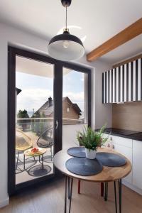 Posedenie v ubytovaní Szumiwoda Apartamenty Kuźnica