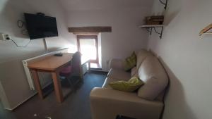 Televízia a/alebo spoločenská miestnosť v ubytovaní Hotel Hospodářský dvůr Bohuslavice