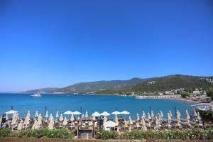 a view of a resort with a body of water at Trendlife Hotels Torba in Bodrum City