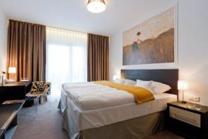 Voodi või voodid majutusasutuse Hotel Mousson toas
