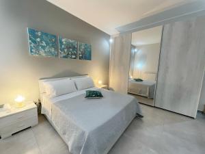 Ένα ή περισσότερα κρεβάτια σε δωμάτιο στο Casa Lulu