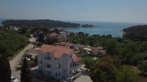 an aerial view of a house and the water at Villa Mara in Pula