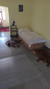 Posteľ alebo postele v izbe v ubytovaní Hotel Hospodářský dvůr Bohuslavice