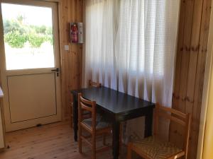Fotografie z fotogalerie ubytování Pervolaris Cottages 2 v destinaci Goudhi