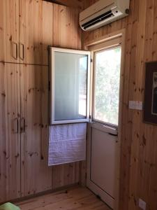 Fotografie z fotogalerie ubytování Pervolaris Cottages 2 v destinaci Goudhi