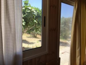 Fotografie z fotogalerie ubytování Pervolaris Cottages 2 v destinaci Goudhi