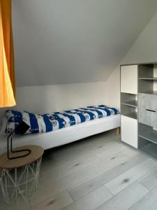 Postel nebo postele na pokoji v ubytování Chachatki Kopalino