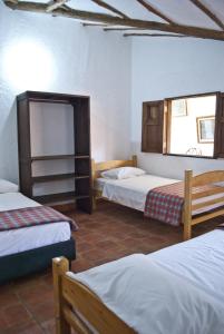 Postel nebo postele na pokoji v ubytování Casa Aparicio Lopez