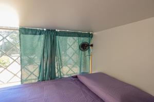 Letto o letti in una camera di Kite Hostel Stagnone