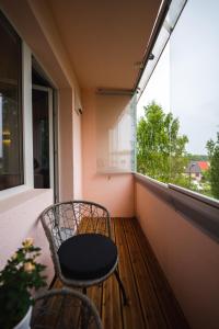 Balkón nebo terasa v ubytování Otepää Holiday Apartment with Jacuzzi