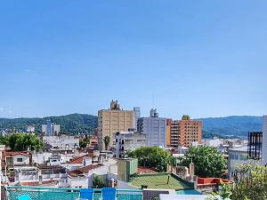 a view of a city with buildings at CASA MARGARITA 5Piso Mono Verde Oscuro in San Salvador de Jujuy