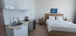 Uma cama ou camas num quarto em Hotel Svarog