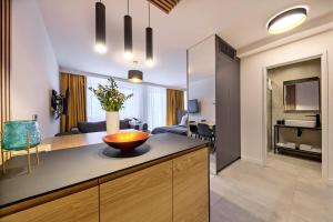 Køkken eller tekøkken på InPoint Apartments G15 near Old Town & Kazimierz District & Optional Paid Parking